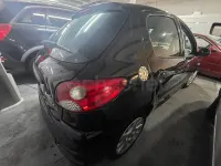 Usado Peugeot 206+ 70 CV (51 kW) 2010 Negro Utilitario