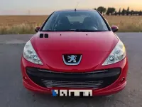 Usado Peugeot 206 68 CV (50 kW) 2012 Rojo Berlina