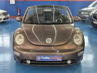 Usado VW New Beetle 100 CV (73 kW) 2003 Marrón Utilitario