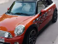 Usado Mini Cooper D 111 CV (81 kW) 2011 Naranja Utilitario