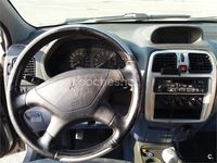 Usado Mitsubishi Space Star Plus 86 CV (63 kW) 1999 Gris / plata Monovolumen