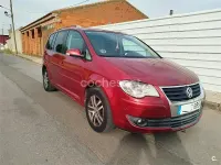 Usado VW Touran 105 CV (77 kW) 2008 Granate Monovolumen