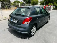 Usado Peugeot 207 Active 92 CV (67 kW) 2012 Gris Utilitario