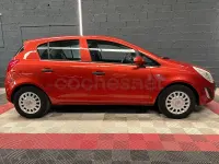 Usado Opel Corsa Essentia 85 CV (62 kW) 2011 Naranja Utilitario