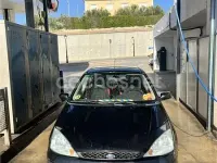 Usado Ford Focus Trend 100 CV (73 kW) 2003 Negro Berlina