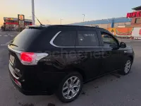Usado Mitsubishi Outlander P-HEV 203 CV (149 kW) 2014 Negro SUV