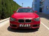 Usado BMW 116 116 CV (85 kW) 2013 Rojo Utilitario