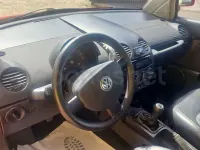 Usado VW New Beetle 90 CV (66 kW) 1999 Rojo Utilitario
