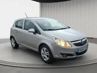 Usado Opel Corsa 86 HP (63 kW) 2010 Cinzento Sedan