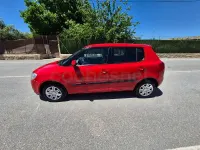 Usado Skoda Fabia 60 CV (44 kW) 2010 Rojo Berlina