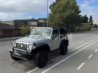 Usado Jeep Wrangler Sport 200 CV (147 kW) 2012 Gris / plata SUV
