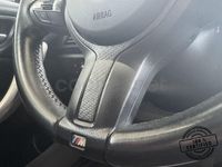 Usado BMW 118 Sport Line 143 CV (105 kW) 2017 Gris Utilitario