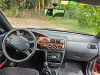 Usado Ford Escort Ghia 90 CV (66 kW) 1998 Granate Berlina