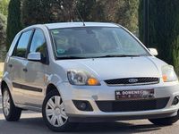 Usado Ford Fiesta Ghia 80 CV (58 kW) 2006 Gris Utilitario