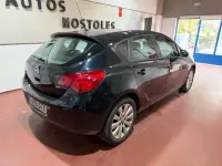 Używany Opel Astra Enjoy 110 KM (80 kW) 2010 Czarny Sedan/Limuzyna