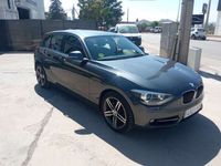 Usado BMW 118 Sport Line 143 CV (105 kW) 2012 Gris Utilitario