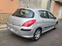 Usado Peugeot 308 120 CV (88 kW) 2009 Gris / plata Berlina