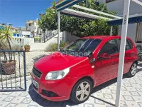 Usado Chevrolet Aveo LS 101 CV (74 kW) 2010 Rojo Berlina