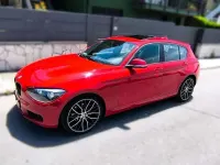 Usado BMW 120 190 CV (139 kW) 2012 Rojo Utilitario