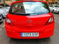 Usado Opel Corsa Cosmo 100 CV (73 kW) 2010 Rojo Utilitario