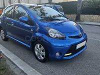 Usado Toyota Aygo City 68 CV (50 kW) 2012 Azul Utilitario