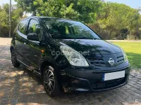 Usado Nissan Pixo Acenta 68 CV (50 kW) 2010 Negro Utilitario
