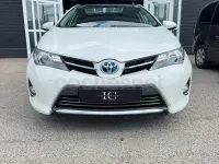 Usado Toyota Auris Hybrid Advance 136 CV (100 kW) 2014 Blanco Berlina