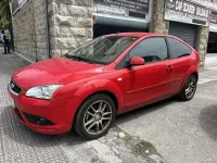 Usado Ford Focus Trend 90 CV (66 kW) 2007 Rojo Utilitario
