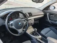 Usado BMW 118 122 CV (89 kW) 2006 Negro Utilitario