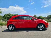 Usado Opel Corsa Selective 95 CV (69 kW) 2011 Rojo Utilitario