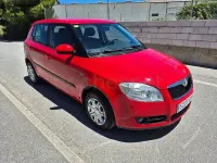 Usado Skoda Fabia 60 CV (44 kW) 2010 Rojo Berlina