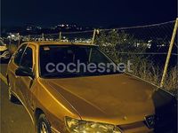 Usado Peugeot 306 90 CV (66 kW) 1998 Naranja Berlina
