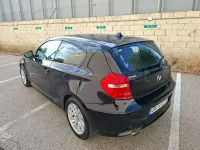 Usado BMW 118 143 CV (105 kW) 2010 Negro Utilitario