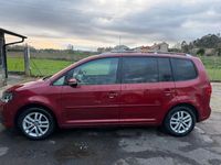 Usado VW Touran Advance 105 CV (77 kW) 2012 Granate Monovolumen