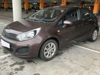 Usado Kia Rio 86 CV (63 kW) 2014 Marrón Utilitario