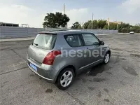 Usado Suzuki Swift GLX 92 CV (67 kW) 2006 Gris / plata Utilitario