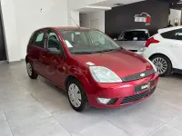 Usado Ford Fiesta Ghia 80 CV (58 kW) 2003 Granate Utilitario