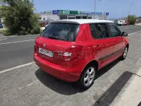 Usado Skoda Fabia Ambition 60 CV (44 kW) 2011 Rojo Berlina