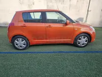Usado Suzuki Swift GL 92 CV (67 kW) 2006 Naranja Utilitario