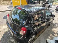 Usado Nissan Micra Premium Edition 80 CV (58 kW) 2011 Negro Utilitario