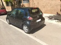 Usado Toyota Aygo 68 CV (50 kW) 2009 Negro Utilitario