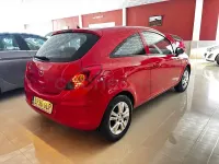 Usado Opel Corsa 80 CV (58 kW) 2009 Rojo Utilitario