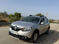 Usado Dacia Sandero Stepway 90 CV (66 kW) 2013 Gris / plata Berlina