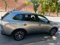 Usado Mitsubishi Outlander P-HEV 203 CV (149 kW) 2015 Gris / plata SUV