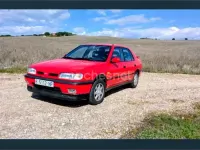 Usado Nissan Sunny 143 CV (105 kW) 1992 Rojo Berlina