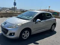 Usado Peugeot 207 75 CV (55 kW) 2012 Gris / plata Berlina