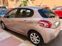 Usado Peugeot 208 Style 82 CV (60 kW) 2014 Gris Utilitario