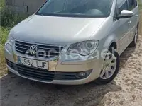 Usado VW Touran 140 CV (102 kW) 2009 Gris / plata Monovolumen