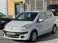 Usado Nissan Pixo Acenta 68 CV (50 kW) 2009 Blanco Utilitario