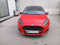 Usado Ford Fiesta Trend 101 CV (74 kW) 2013 Rojo Utilitario